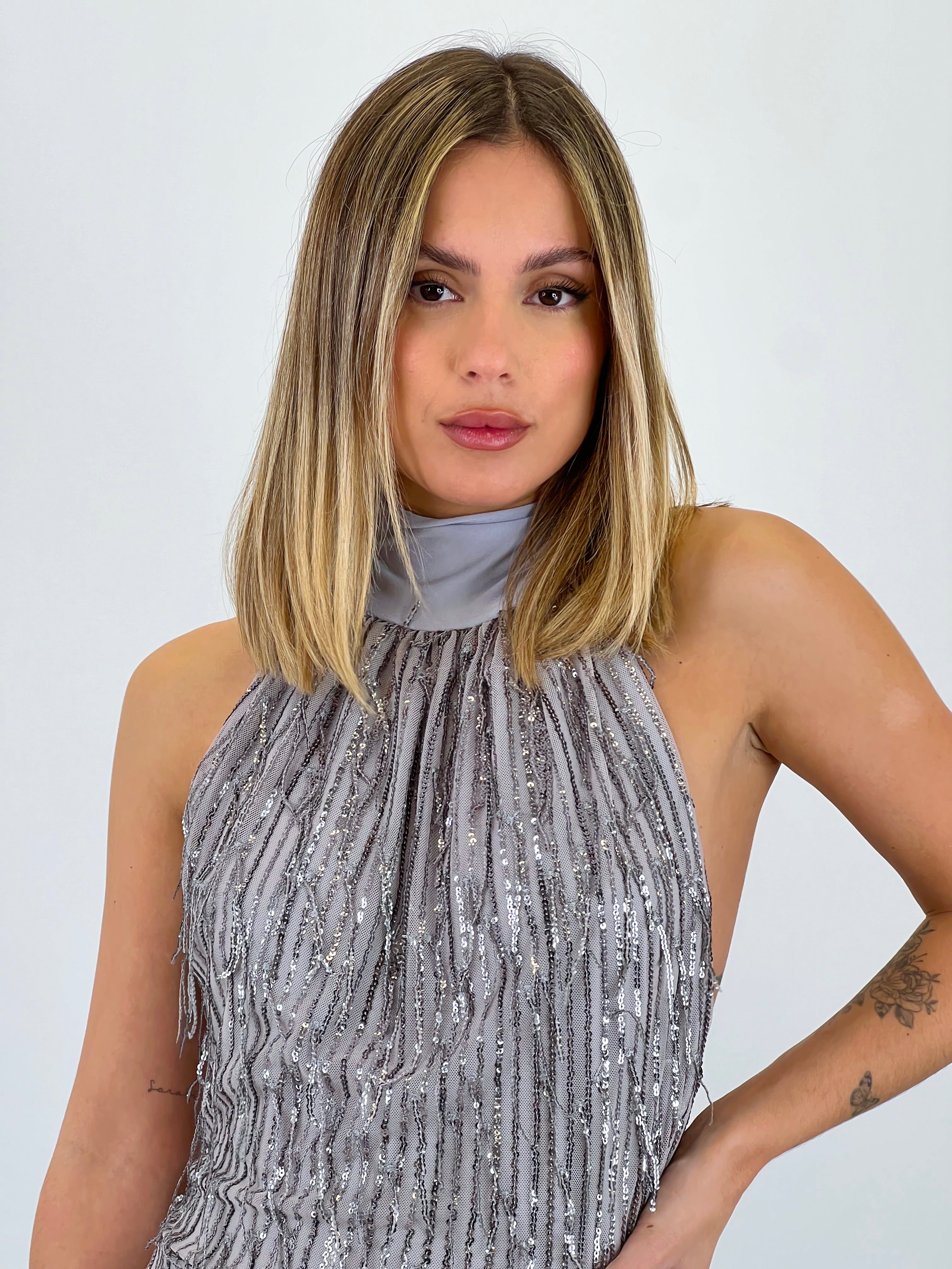 Mono halter con frange e paillettes