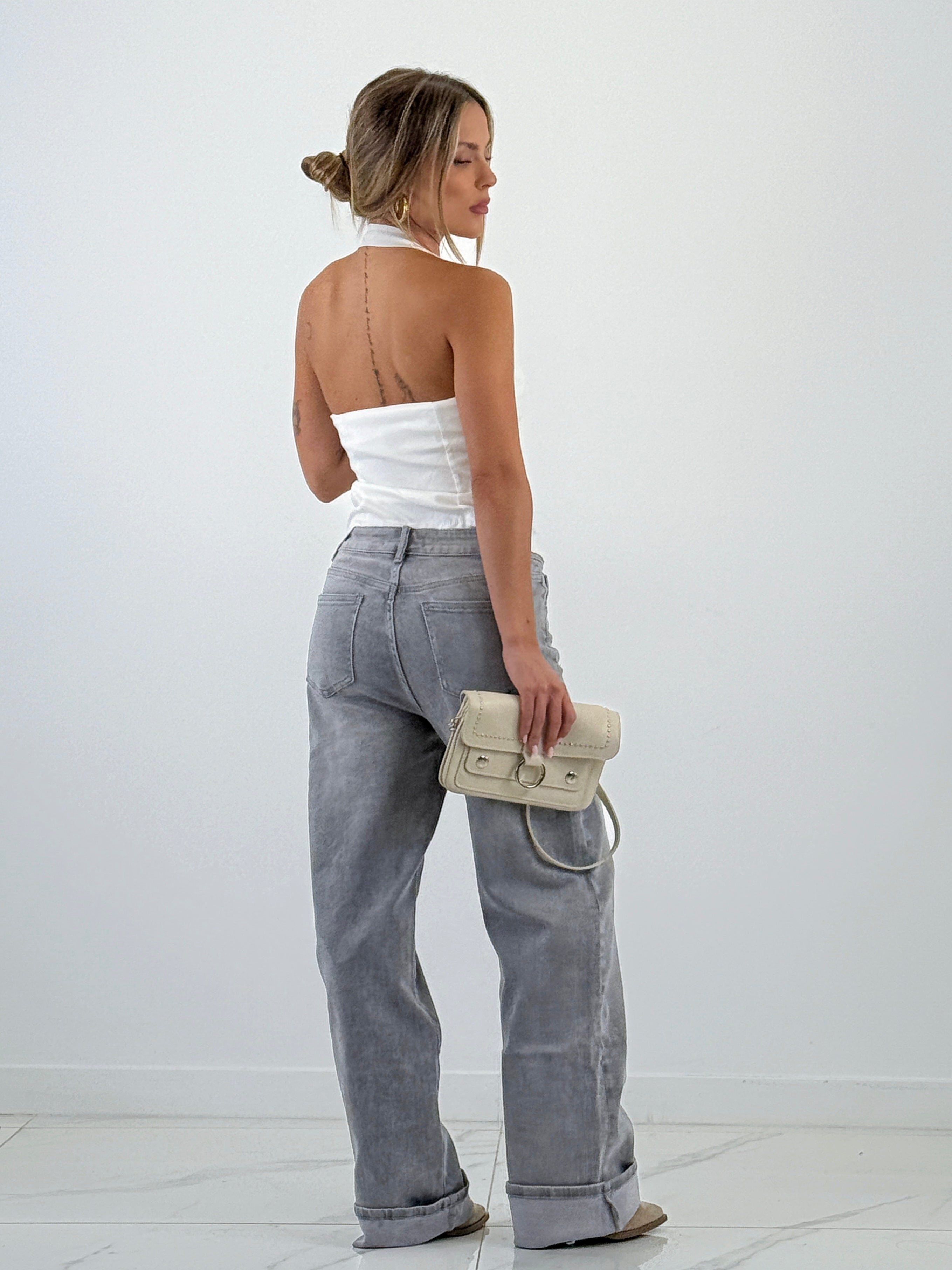 Bolsa de pele com tachas