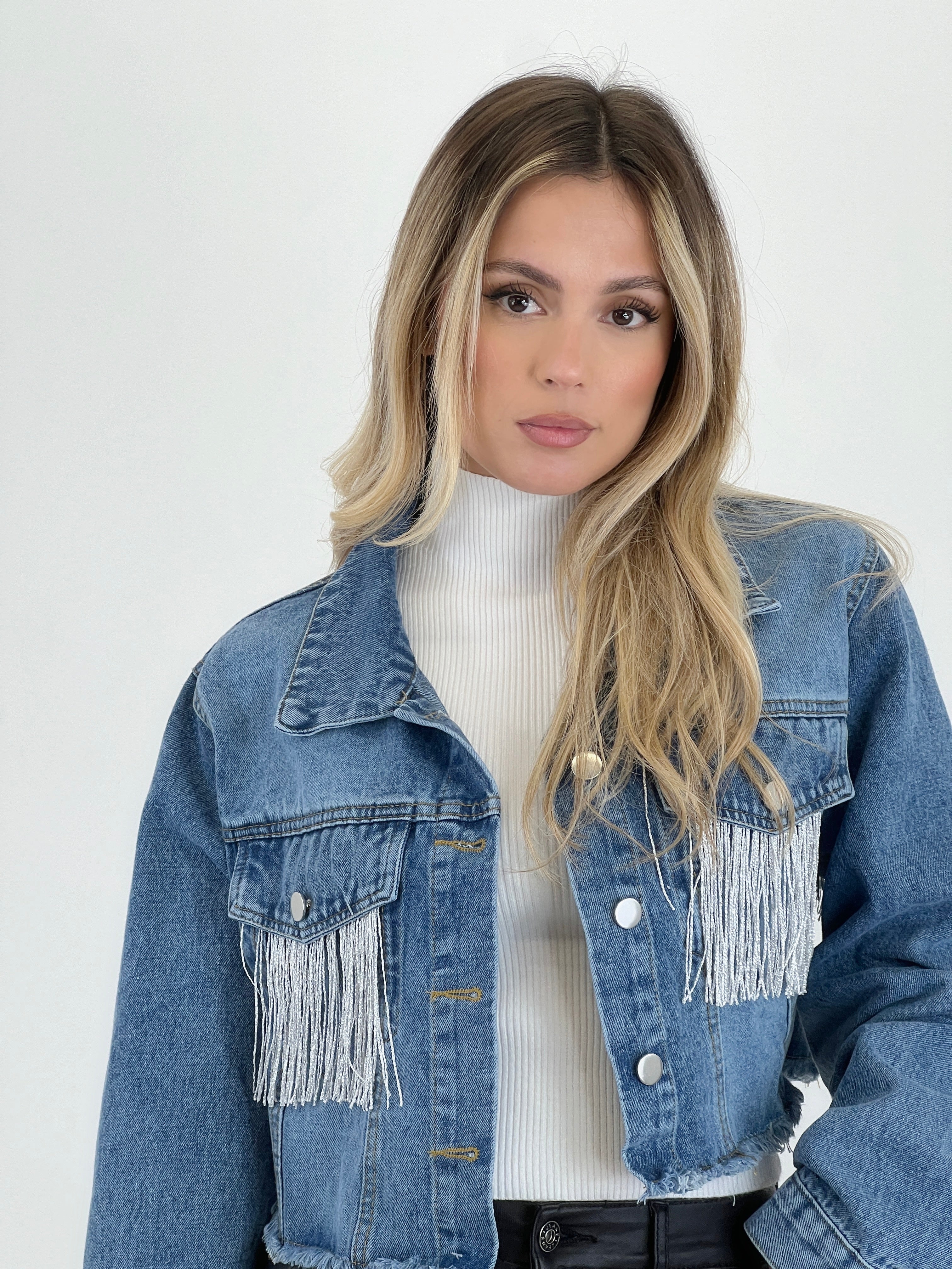 Jaqueta denim amb serrells