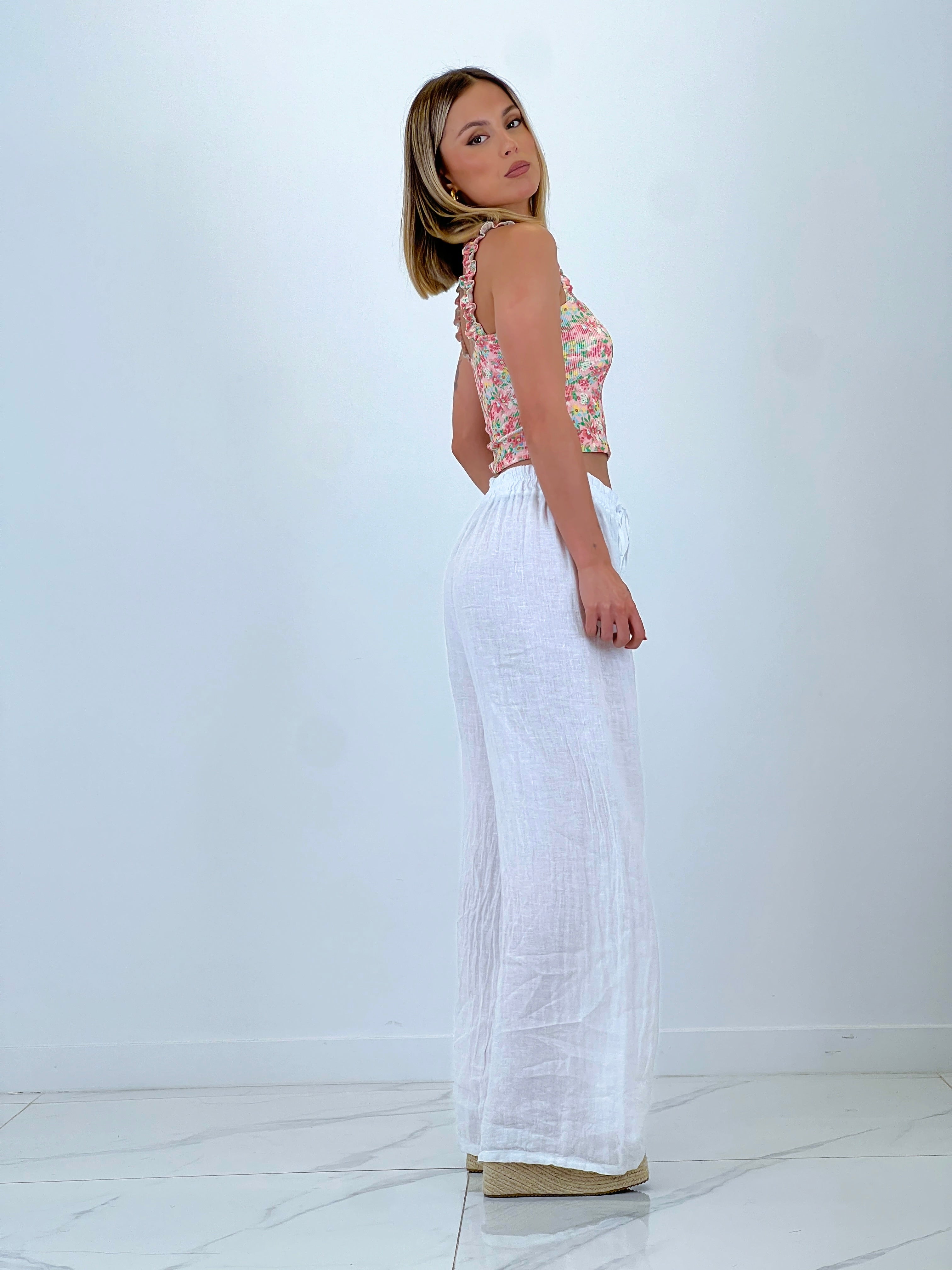 Linen flared trousers with elastic