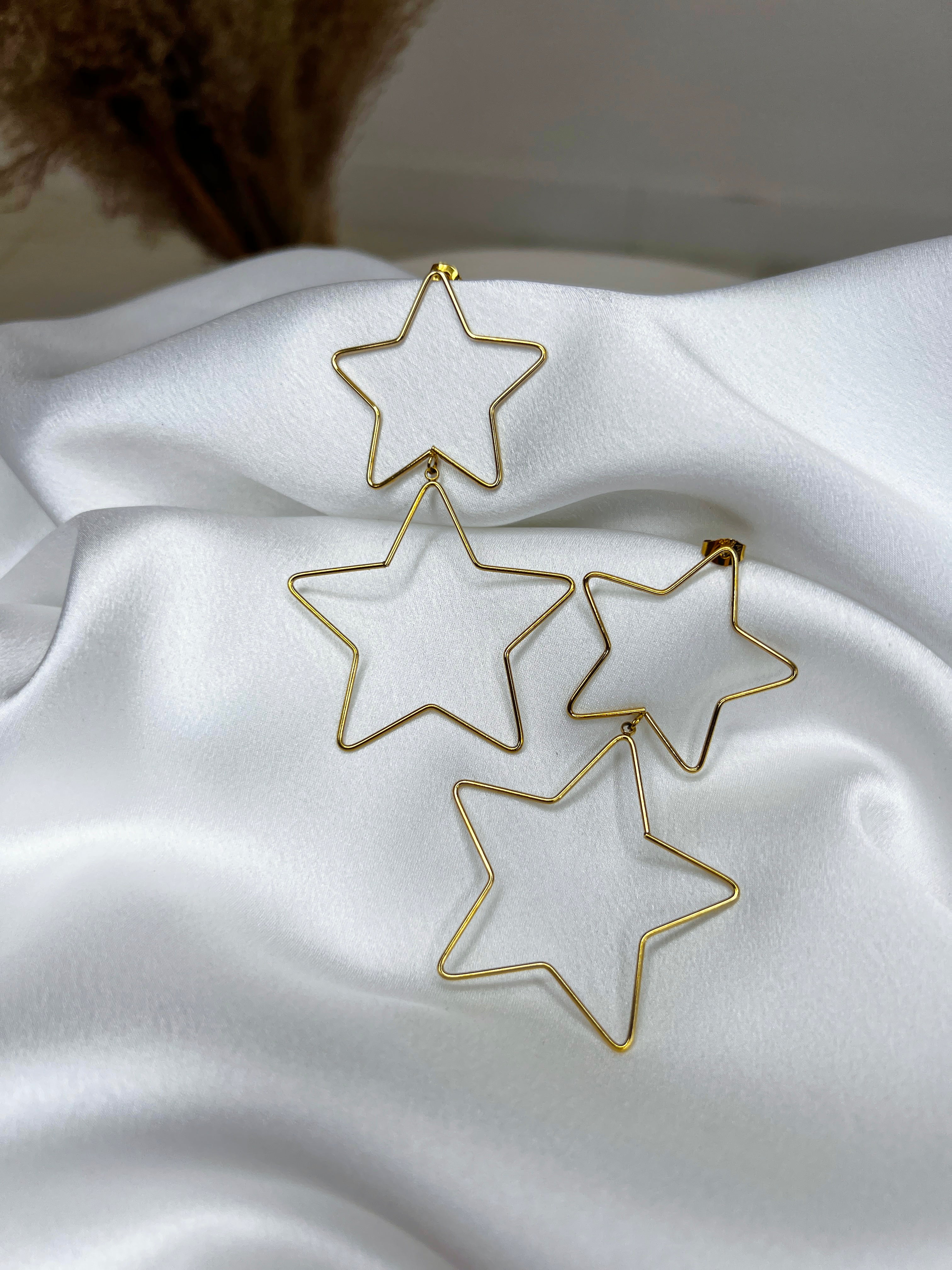 Brincos dupla estrela